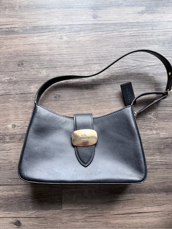 Coach Handbags - Coach Black Leather Shoulder Bag with Gold-Tone Plaque